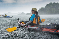 Kayaking in rain, Raja Ampat, Indonesia